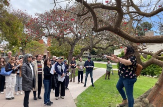 Cameron Hannah-Bick, far right, leads the Very Important Trees tour